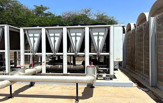 Chiller units along perimeter screen wall